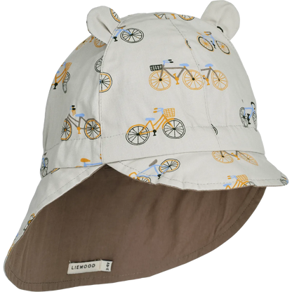 Liewood omkeerbare zonnehoed met kap en oor - Gorm - Fiets / Wolkenblauw - Zonnehoed - MamaMilla